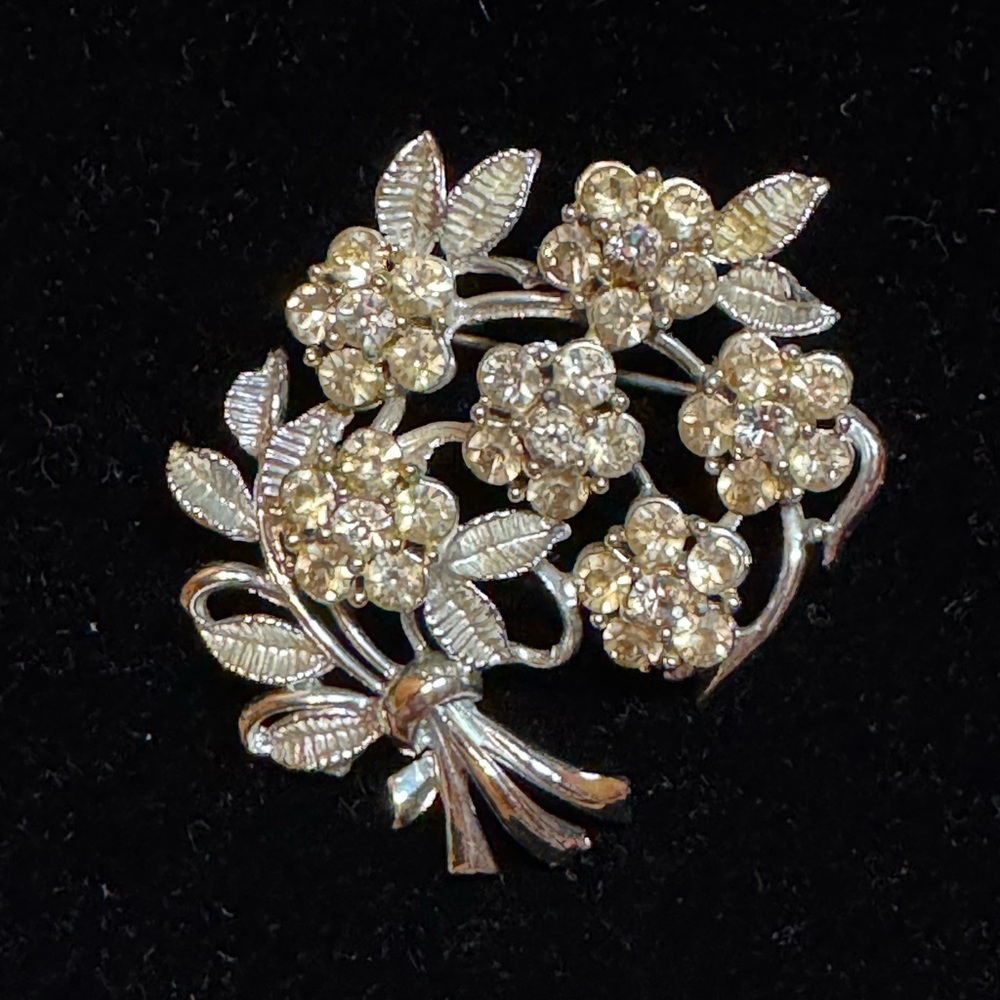 Vintage Elegant Floral Brooch in Silver Toned Rhinestones